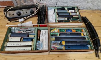 A box containing Hornby 00 gauge model railway items to include locos, controller, track, rolling