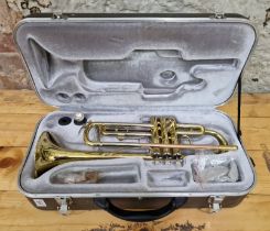 An Odysey trumpet in hard case.