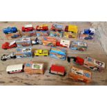 A group of fourteen assorted Matchbox 75 Series diecast model vehicles, with boxes.