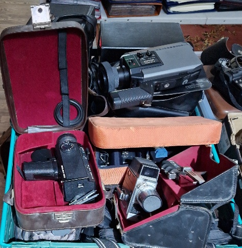 Two boxes of assorted cine camera, video cameras & accesoories etc. to include a Bell...