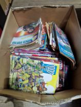 A large box of Judge Dread comics.