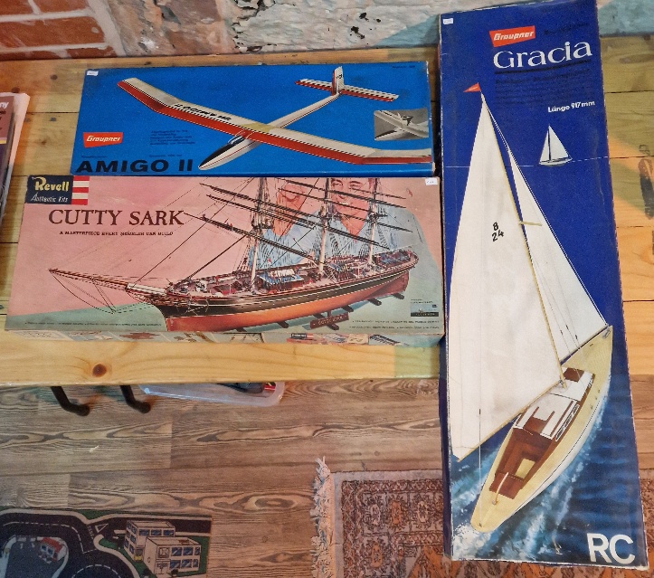 Three unbuilt model kits comprising of a Revell Cutty Sark 1/96 scale, a Graupner 'Gracia' yaught