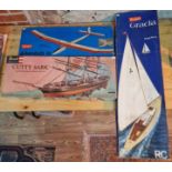 Three unbuilt model kits comprising of a Revell Cutty Sark 1/96 scale, a Graupner 'Gracia' yaught