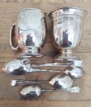 A mixed lot of hallmarked silver comprising two tankards and four spoons, weight 176g.