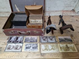 Two stereoscopic viewers and assorted slides including Boer War.