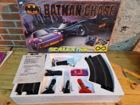 A Scalextric Batman Chase car racing game.
