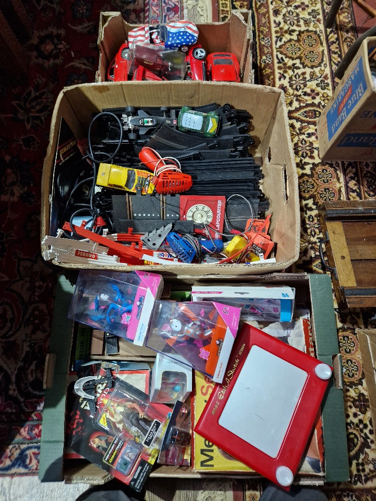 Two boxes of assorted toys to include Scalextic, Star wars, an Etch A Sketch & a childrens ty...