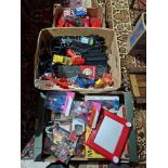 Two boxes of assorted toys to include Scalextic, Star wars, an Etch A Sketch & a childrens ty...