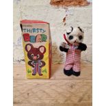 An "alps" japanese mechanical toy "thirsty bear", boxed.