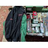 A box of assorted boxed Eddie Stobart Corgi diecast vehicles & an Eddie Stobart fleece jacket.