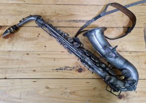 A plated Dearman saxophone, marked 228.
