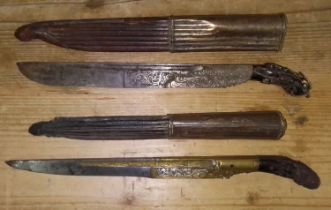 Two 19th century Chinese trousse knives with scabbards.