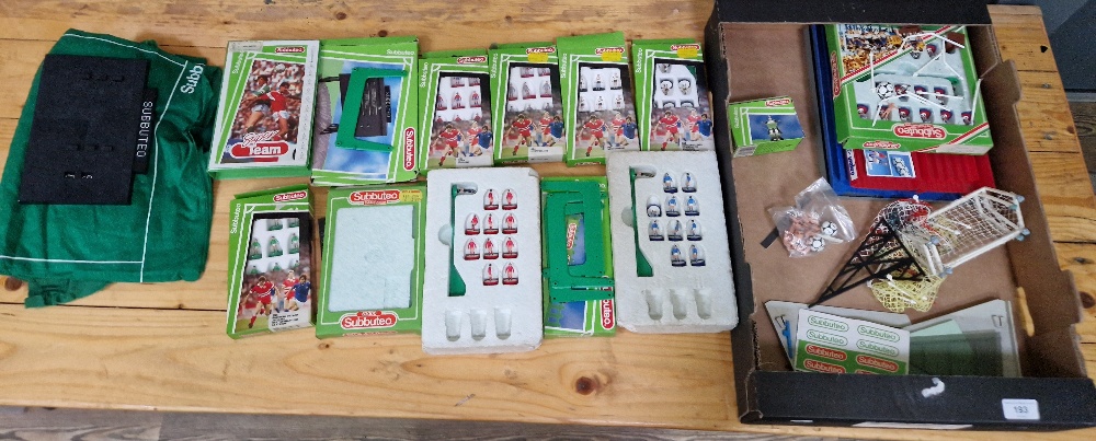 A box of assorted subbuteo items