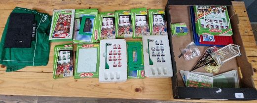 A box of assorted subbuteo items