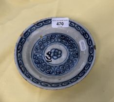 An early tin glazed earthenware dish, possibly Portuguese, possibly Delft, diameter appx 16cm