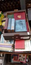 Three boxes of assorted books