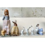 2 matt finish Lladro figures - Girl with dog (height appx 37cm), Girl with hands behind back (appx
