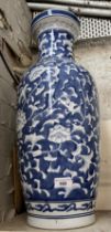 Large blue and white vase with floral pattern