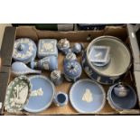 A box of mostly blue Wedgwood jasperware.