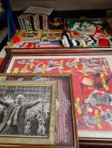 A mixed lot of Liverpool FC memorabilia including football programmes, scarves, framed pictures