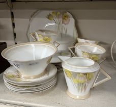 A 1930s Shelley Art Deco tea service, Eve shape decorated with yellow tulips, 19 pieces.