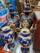 4 ceramic urns.