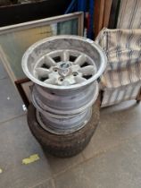 A set of 4 Superlight 7JJ X 13 alloy wheels, 2 with tyres.