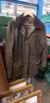 A Classic Ladies Barbour Waxed Jacket with detachable Hood. (Size 14)