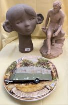 Three pieces to include a 1950s Willerby caravan wall plaque, a 1960s Tekt USSR terracotta bust, and