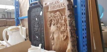 A woodcarving depicting Dylan Thomas inscribed 'J H, 1983' together with an Indian carved hardwood