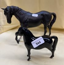 A matt black Beswick horse figure, appx 18cm tall, and a glazed black horse with John Beswick