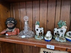 A lot of mixed collectables including Staffordshire pottery animals, cast metal money box and a