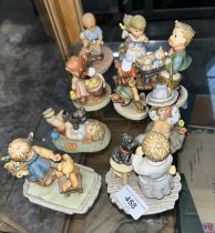 3 vintage Hummel figures, together with 7 modern (Thailand) figures marked Berta Hummel