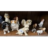 11 dogs including a Sylvac apricot poodle and other Sylvac, Beswick, Royal Doulton etc.