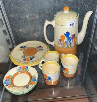 A circa 1930s Clarice Cliff 'Crocus' tea / coffee pot with dish, 4 saucers and 3 cups.