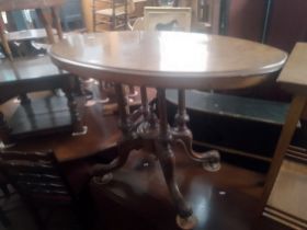 A Victorian inlaid walnut table.