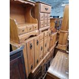 Various items of hardwood furniture; sideboard, tall boy, side cabinet, drawers, etc.