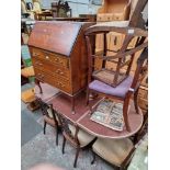 Various items of furniture; mahogany bureau, side cabinet, two chairs and a mahogany extending
