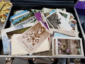 A case of assorted postcards & cigarette cards