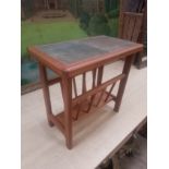 A mid 20th century teak and tile top magazine rack/table.