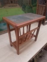A mid 20th century teak and tile top magazine rack/table.