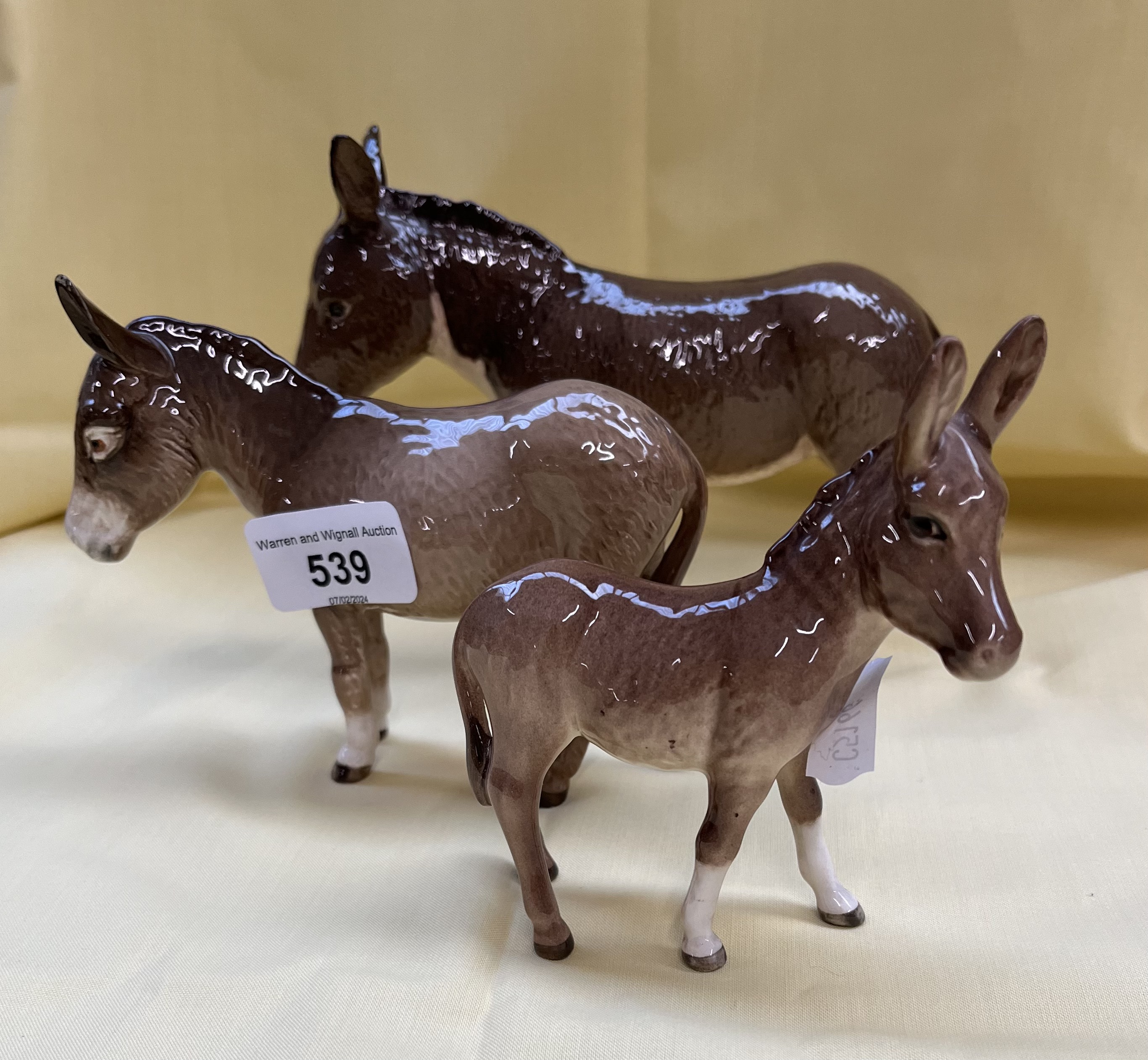 3 Beswick donkey figures - heights 14, 12 11 cm appx