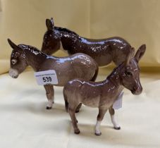 3 Beswick donkey figures - heights 14, 12 11 cm appx