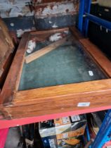 A table top display cabinet.