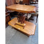 Two carved hardwood elephant tables.