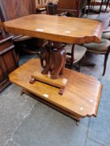 Two carved hardwood elephant tables.