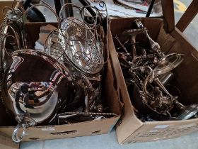 Two boxes of silver plated ware including teapots, dishes, cake stand, cutlery and some pewter.