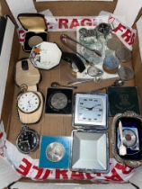 A mixed lot comprising coins, banknotes, pocket watches, silver, etc.