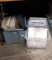 Two boxes of vinyl records, various artists & genres including rock and pop.