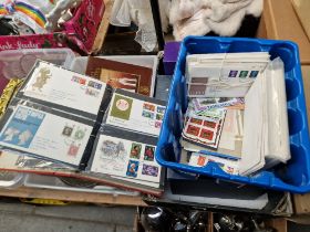 A box of assorted first day covers and miniature sheets etc.